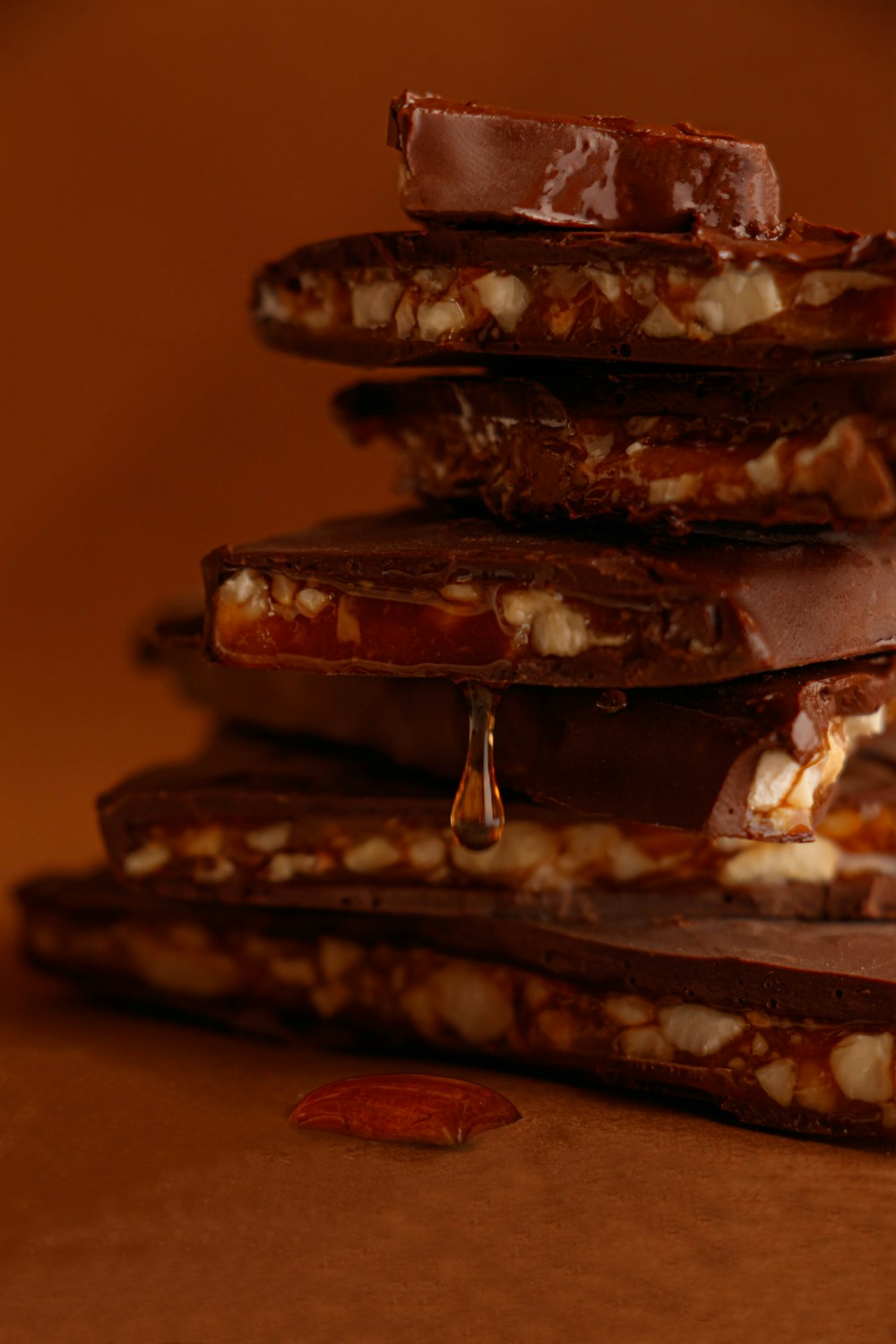 Stack of Dubai chocolate bars filled with pistachio and crispy kunafa